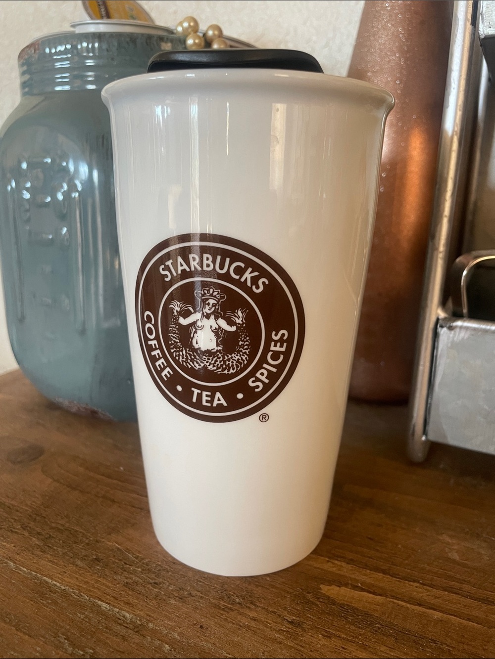 Starbucks Pike Place ceramic travel tumbler featuring retro brown mermaid logo